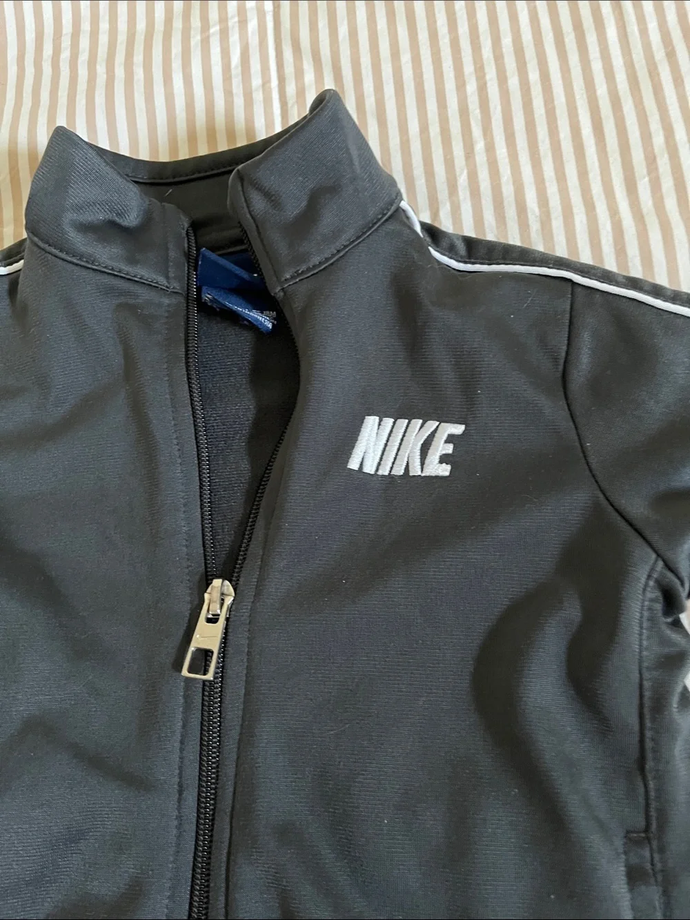 Nike Black Track Jacket with White Logo & Piping